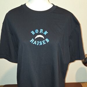 BORN X RAISED Los Angeles Chargers Black Tee with Blue And Gold Accents